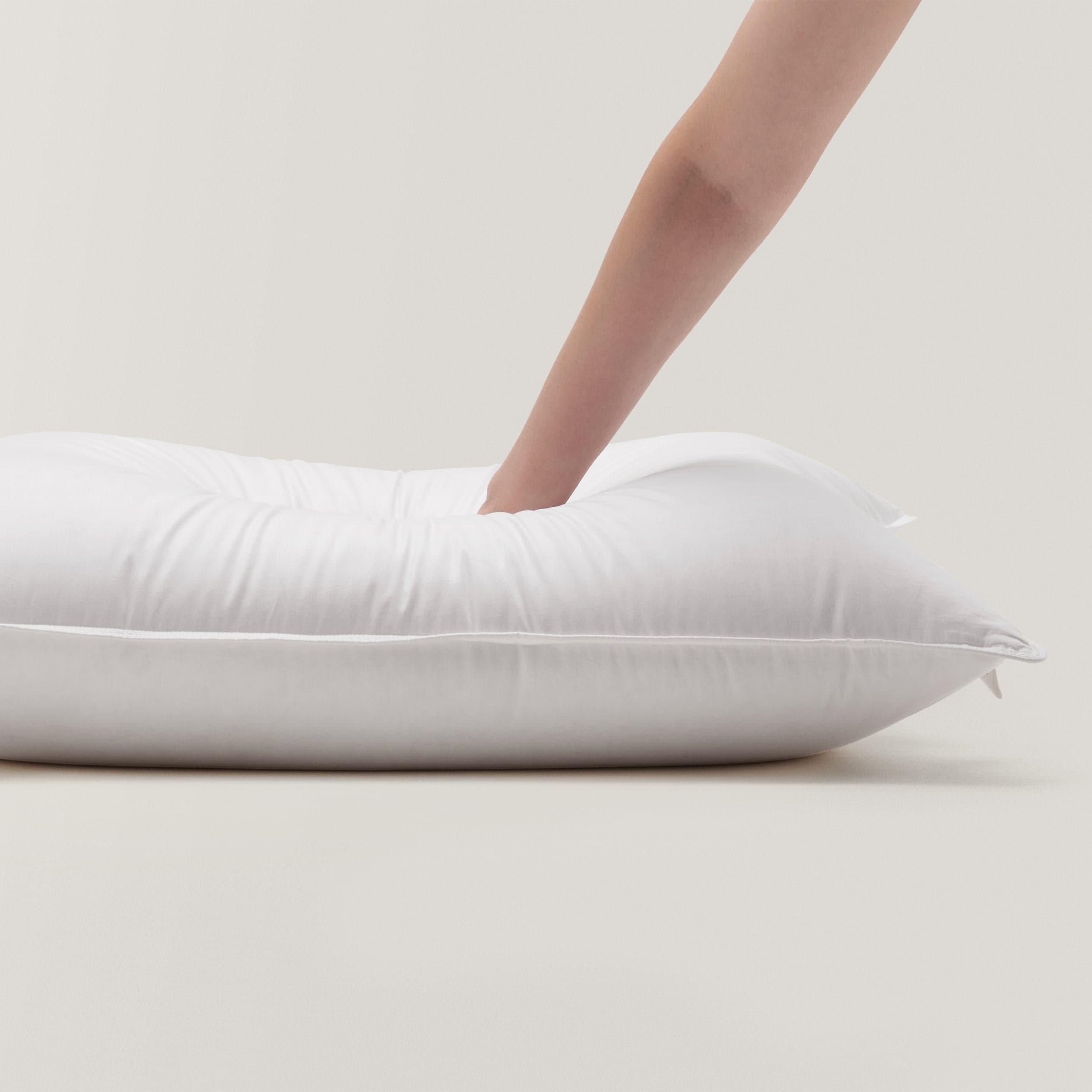 The softness of the down pillow makes it the perfect companion for a cozy afternoon nap.