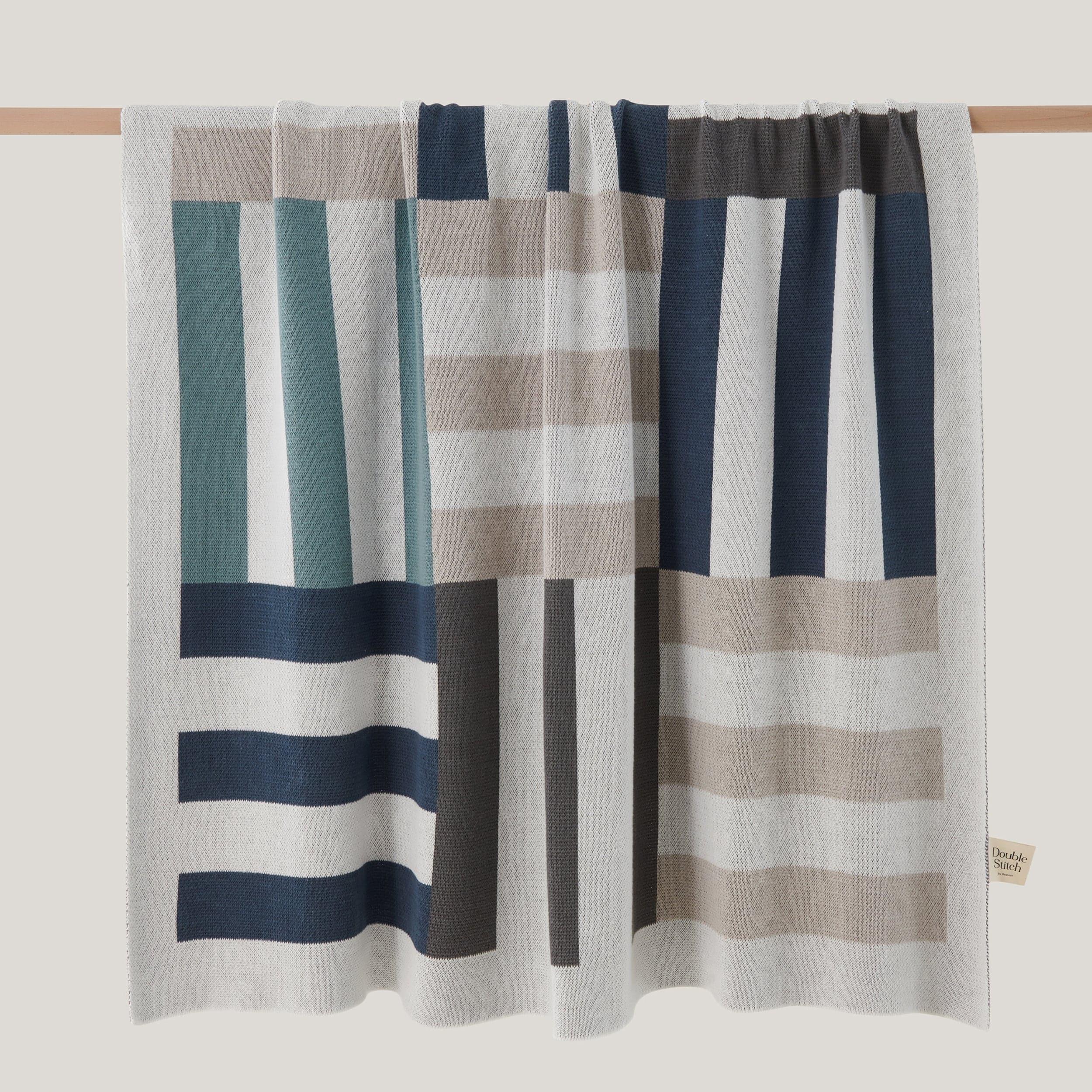The Intarsia knit throw blanket makes a thoughtful and elegant gift for anyone who appreciates the beauty of handcrafted textiles.