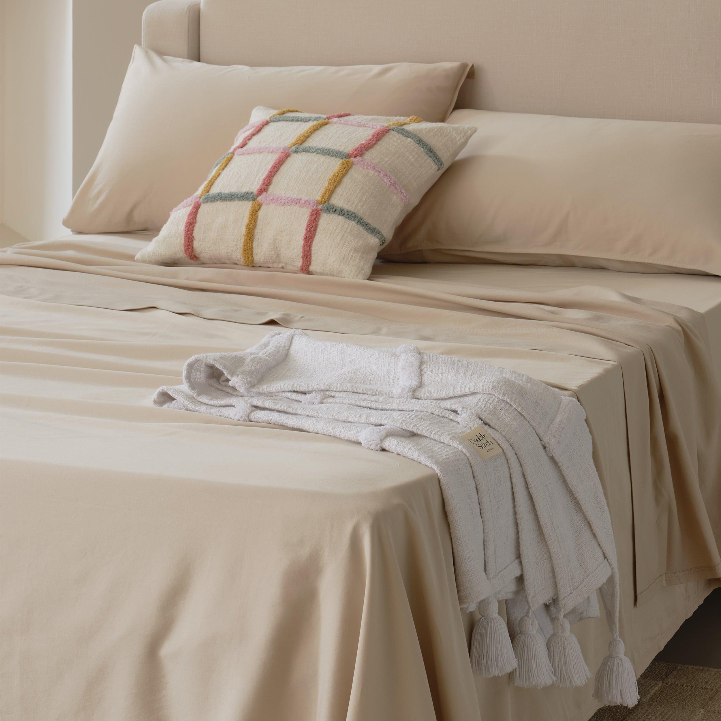 Complete your bedroom decor with our stylish king bed sheet sets, adding a touch of elegance to your space.