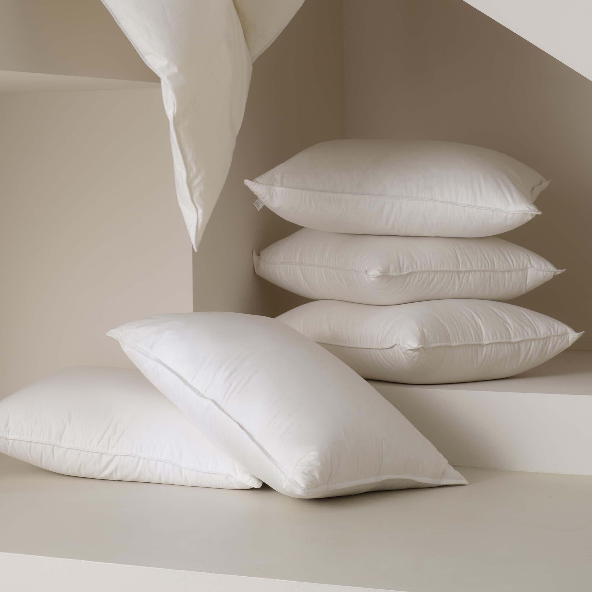 The white down pillow provides the perfect balance of softness and firmness for optimal neck and head support.